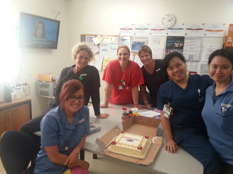Staff at Ryde Hospital dig in to Skinners cake
