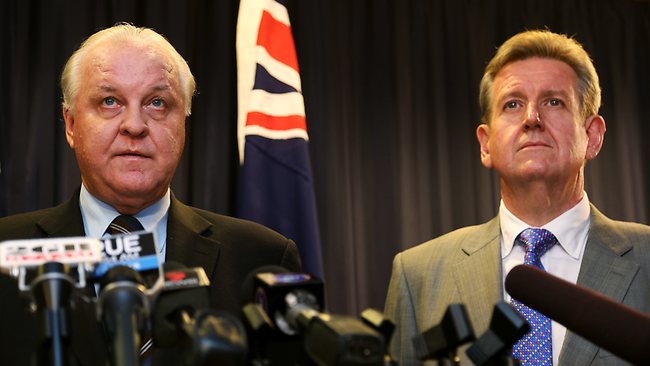 Barry and his "best man for the job" Pearce front the press