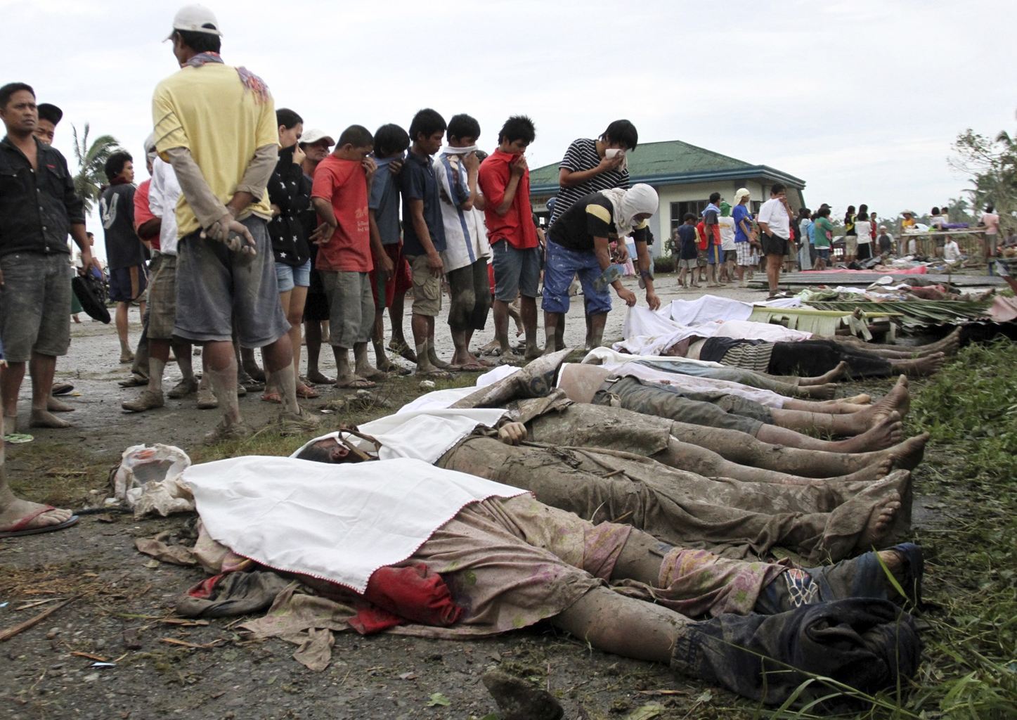 Looking for the bodies of family members in the Philippines after the deadly typhoon