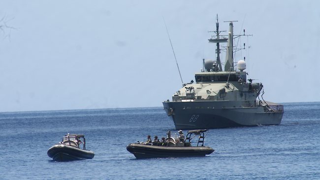 Searching for the sign that says Indonesian Border