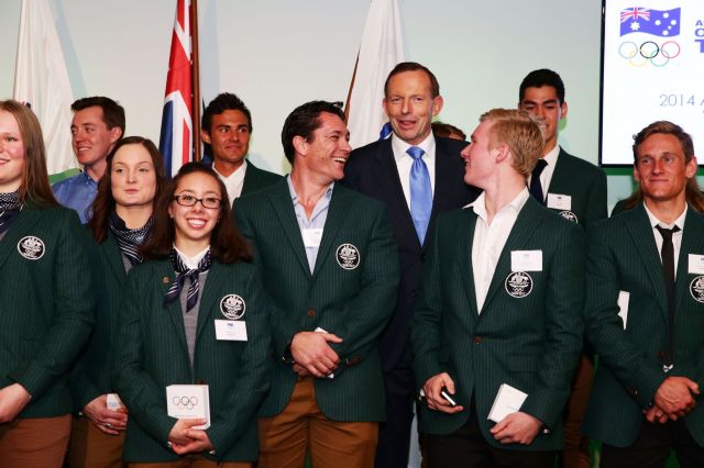 Abbott poses with some of the athletes