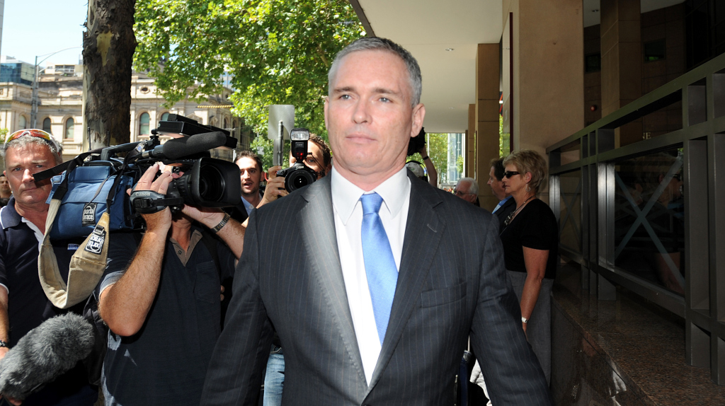 The long walk from court Photo - AAP